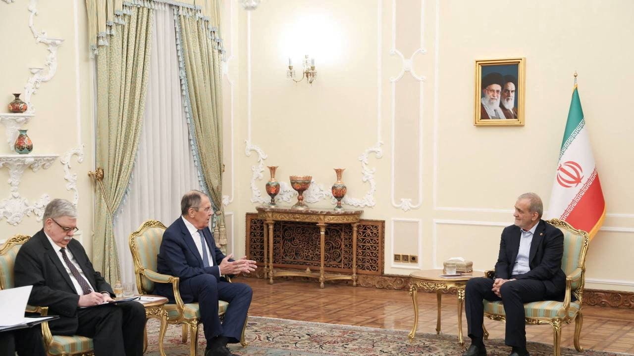 Russian Foreign Minister Sergei Lavrov and Iranian President Masoud Pezeshkian attend a meeting in Tehran, Iran, October 19, 2026.