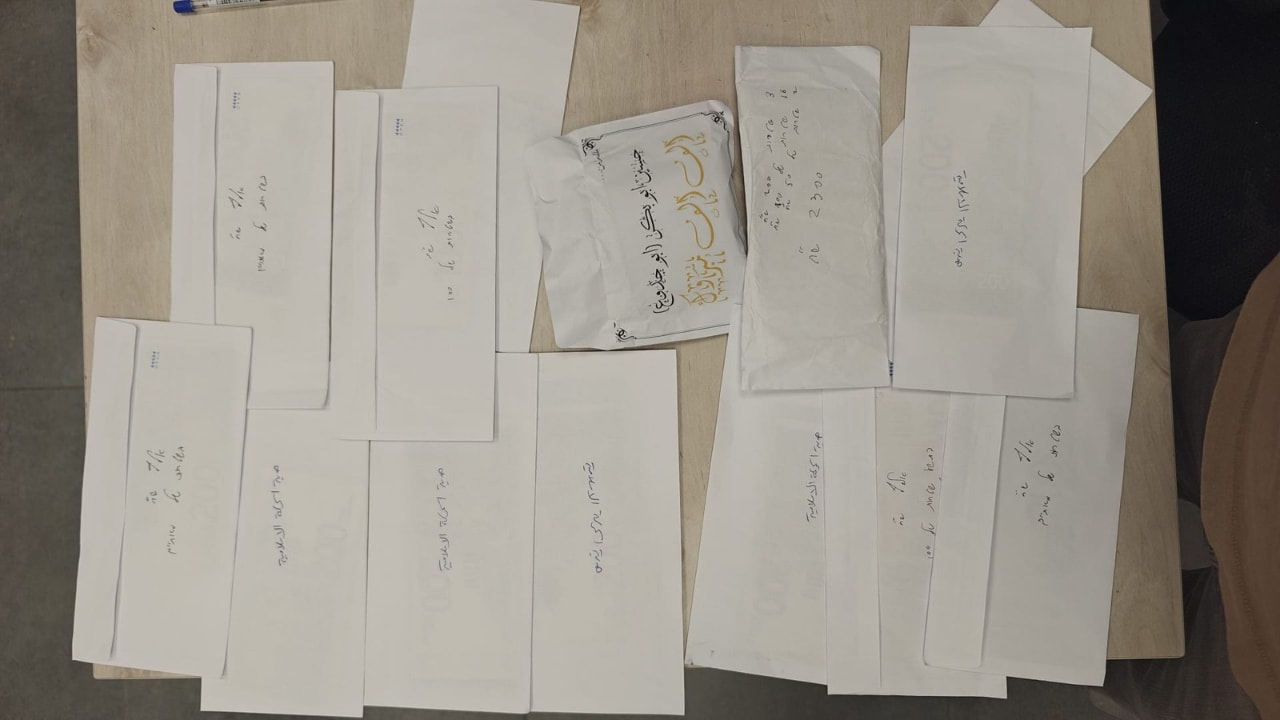 Envelopes of cash siezed by Israel Police during raid on homes of individuals suspected of election fraud in southern Israel, October 27, 2026.