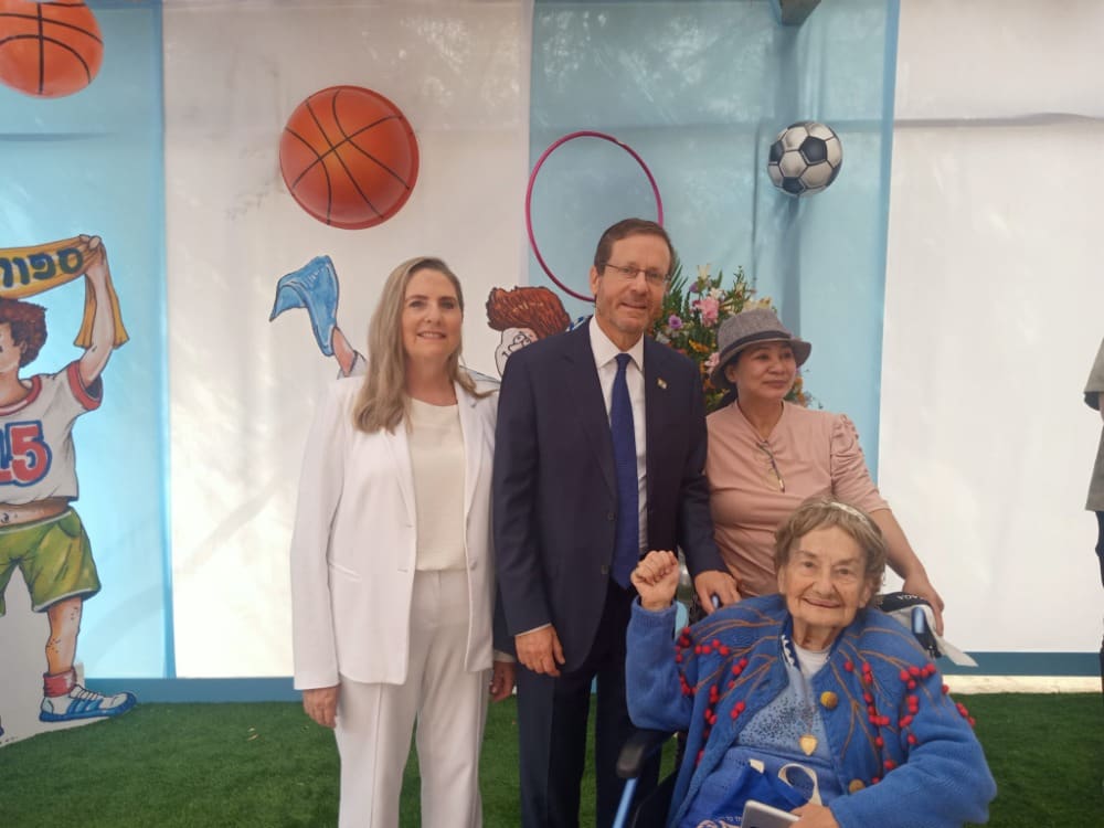 Shulamit Newman was a regular visitor at the President’s Residence on Sukkot. Here, she posed with President  Isaac Herzog and his wife, Michal. (photo credit: Courtesy the Newman family)