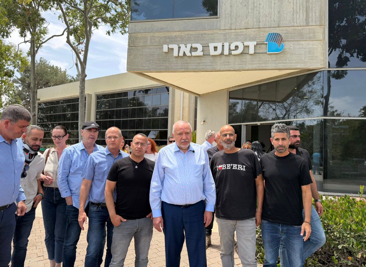 Yisrael Beytenu leader MK Avigdor Liberman and members of his party at a tour in Kibbutz Be