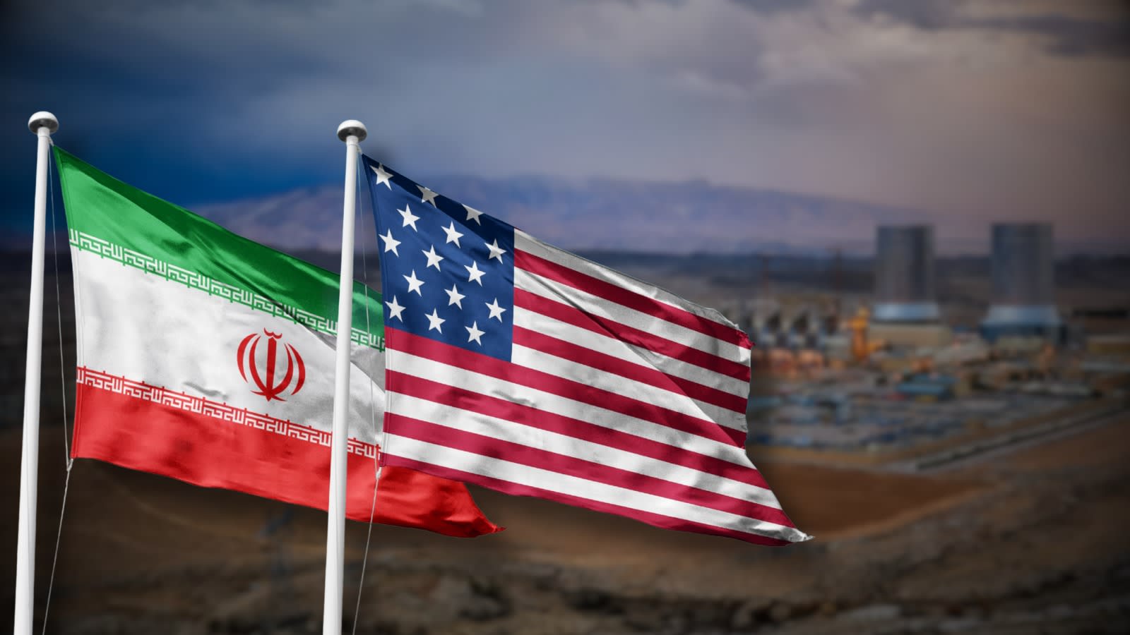 Iranian, American flags against backdrop of Iranian nuclear site. (illustration) (photo credit: Shutterstock/L_B_Photography, em_concepts)