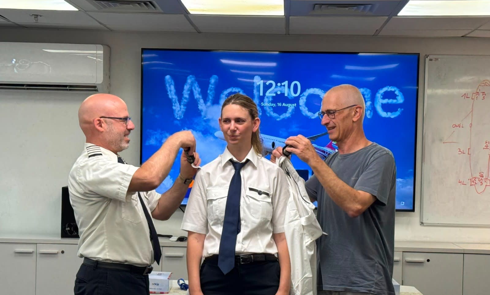 From right to left: Tal Madutzky, Arkia Captain; Adar Madutzky, Arkia Captain; and Noam Adar, Arkia Fleet Manager. (photo credit: Arkia Spokesperson’s Office)