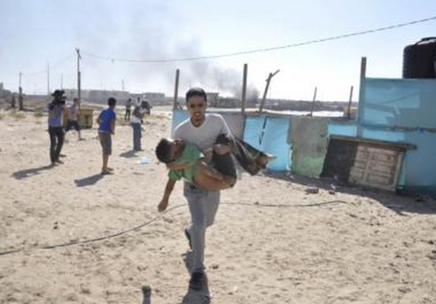 Army opens criminal probe of IDF strike on Gaza beach that killed 4