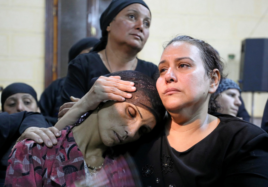 A mother of one of the victims of an attack on a group of Coptic Christians attends a funeral at the Sacred Family Church in Minya, May 26, 2017. REUTERS/Mohamed Abd El Ghany