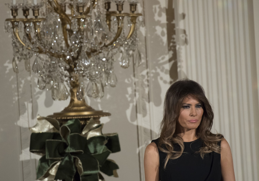 First Lady Melania Trump attends a Hanukkah reception in the East Room of the White House in Washington, DC, December 7, 2017.  SAUL LOEB / AFP 