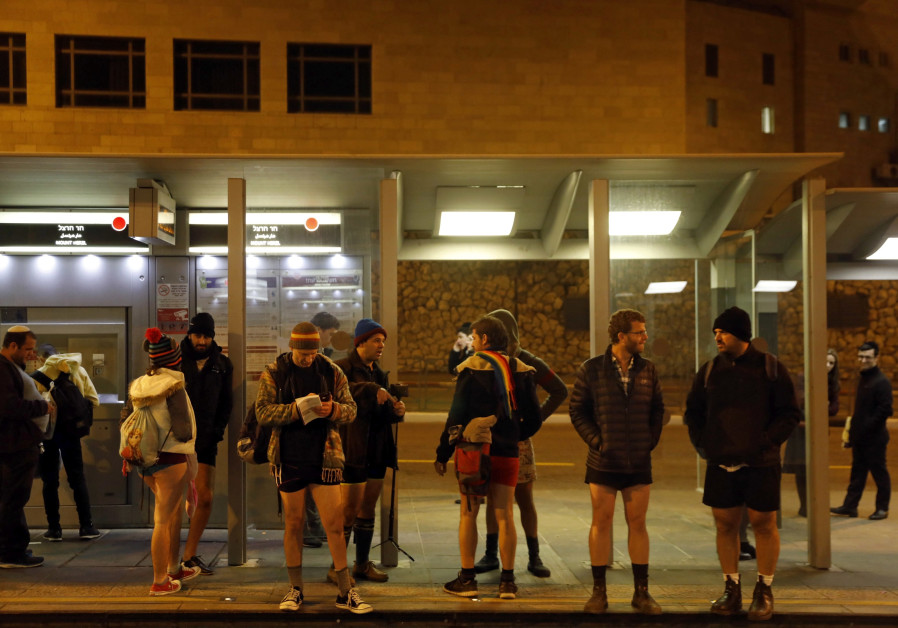 Israelis take part in an annual "No Pants Day" on Jerusalem's Light Rail (credit: Ronen Zvulun/ Reuters)