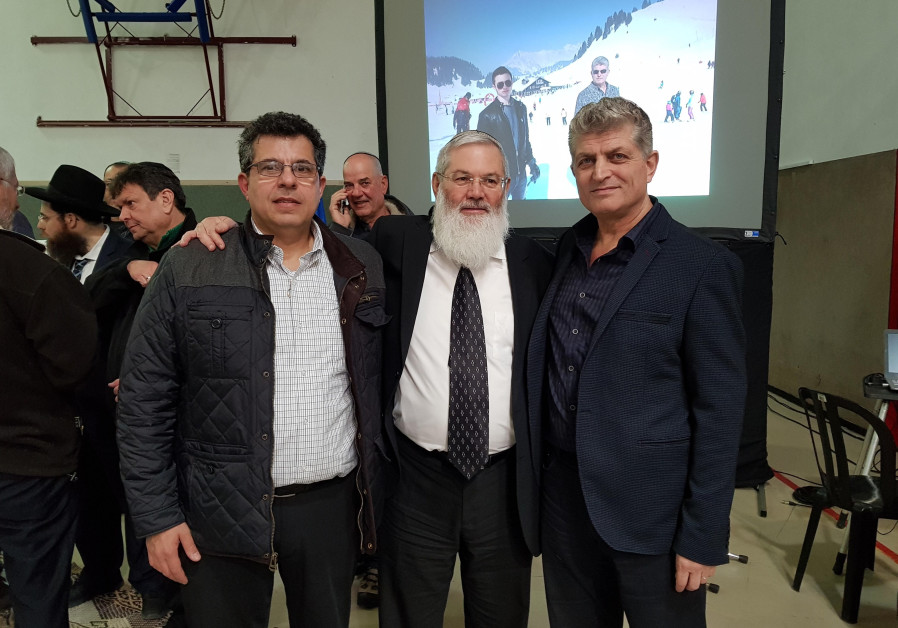 Deputy Defense Minister Eli Ben-Dahan attends ceremony celebrating the donation of a Torah scroll in honor of IDF soldier murdered in Arad with the soldier's father (credit: Dima Dorf)