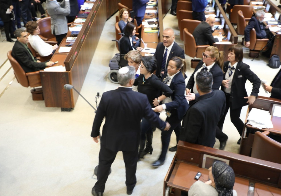 MK Haneen Zoabi [Balad] removed from Knesset after protesting during speech by US Vice President Mike Pence  YITZHAK HARARI 