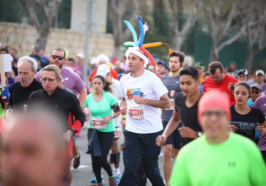 Participants in the Jerusalem Marathon, March 2018 (credit: Yitzhak Kelman/ TPS)