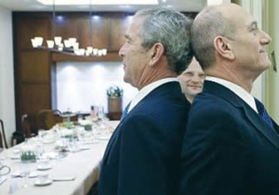 George Bush and Ehud Olmert (credit: Eric Draper)