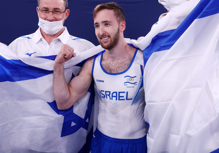  Artem Dolgopyat of Israel celebrates after winning gold