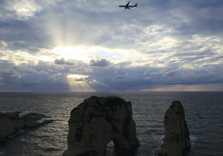 An airplane flies out of Beirutâs International Airport.