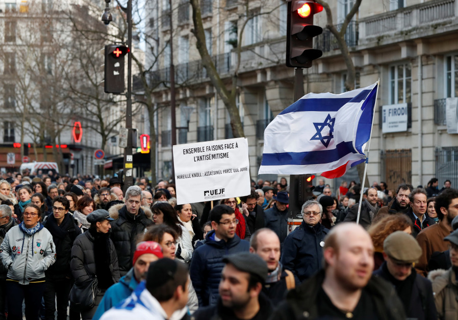 People participate in a unity rally after the murder of French Holocaust survivor Mireille Knoll in 