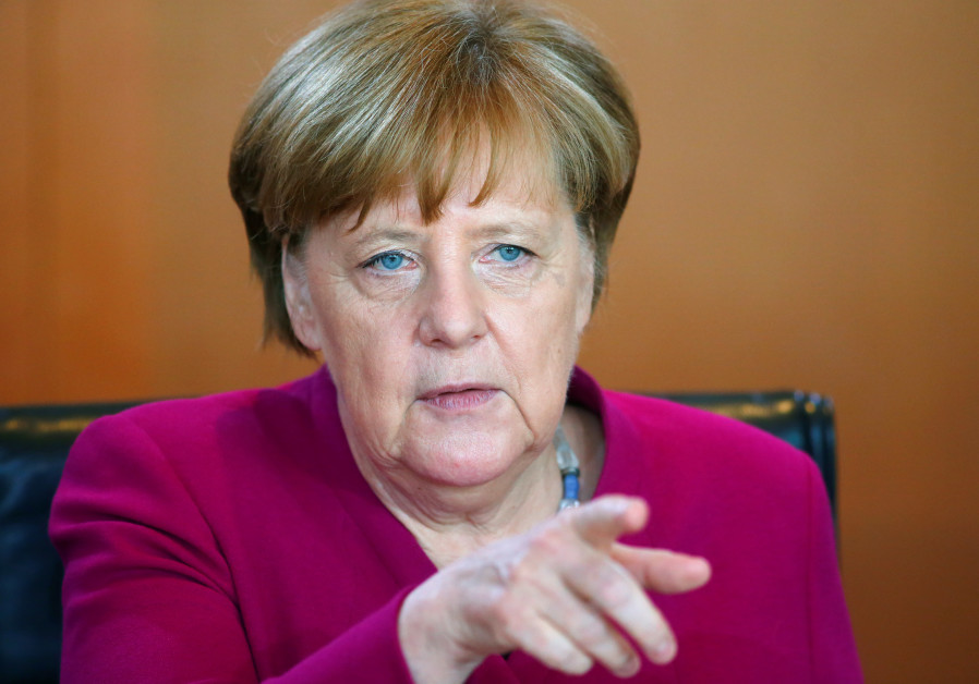 Angela Merkel gestures during a cabinet meeting in Berlin