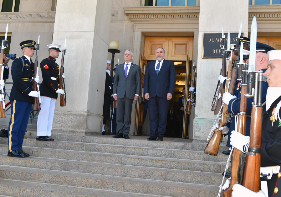 United States Secretary of Defense James Mattis (L) poses for a photo with Avigdor Liberman