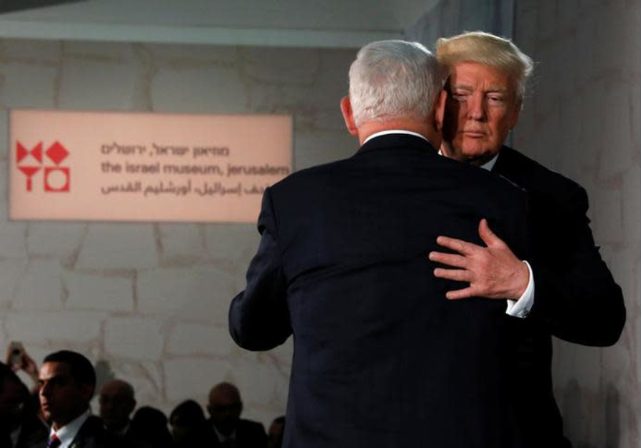 U.S. President Donald Trump (R) embraces Israel's Prime Minister Benjamin Netanyahu