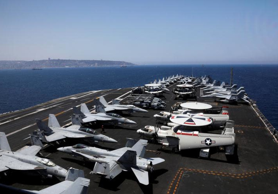 A general view shows the dock of the U.S. aircraft carrier USS George H. W. Bush, as it docks at Hai