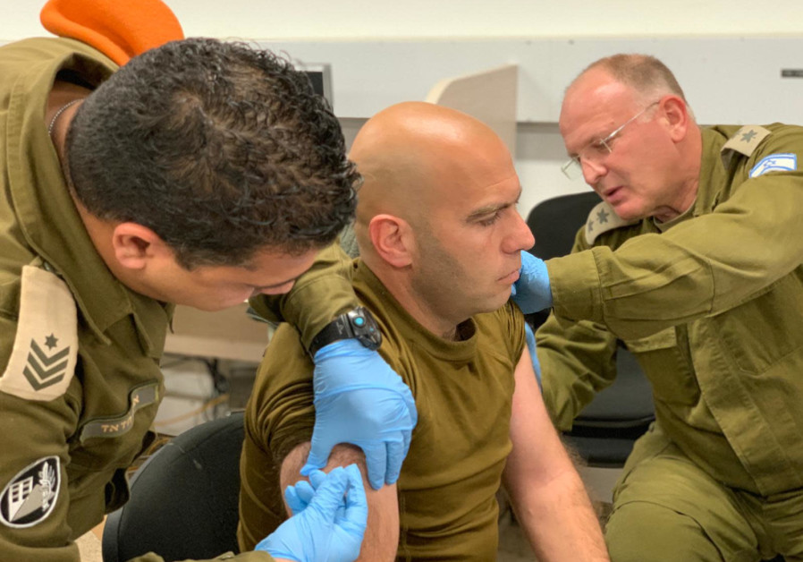  IDF Home Front Command officers get vaccinated before flying to Brazil for humanitarian relief efforts on January 27, 2019