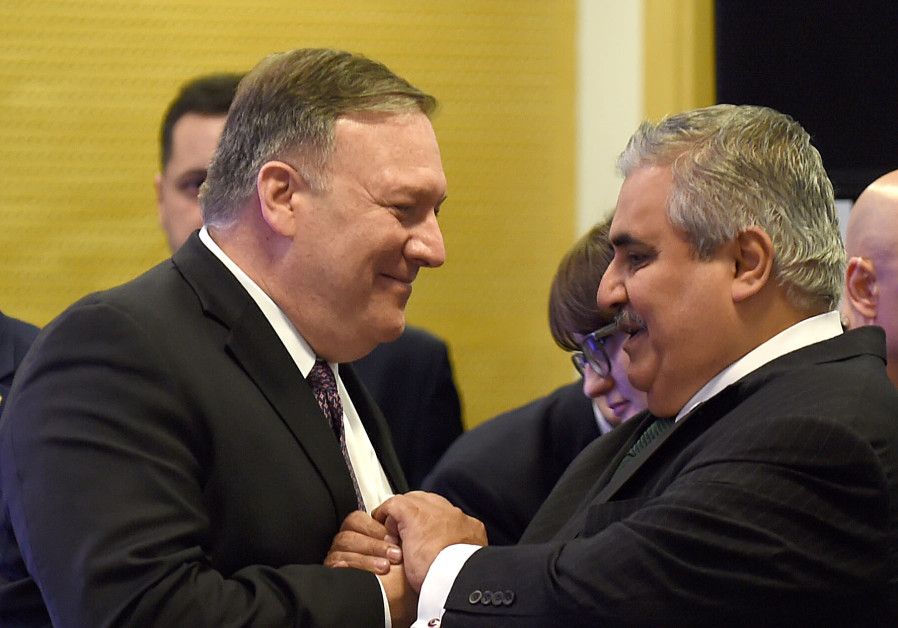 US Secretary of State Mike Pompeo (L) greets Bahrain Foreign Minister Khalid bin Ahmed al-Khalifah