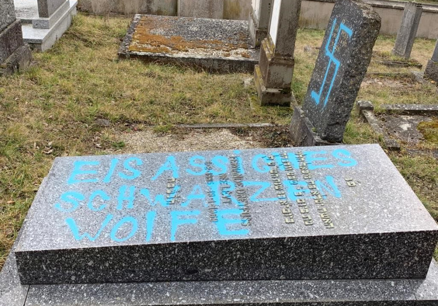 Gravestones at the Jewish cemetery in Quatzenheim, France vandalized with Nazi graffiti, February 19, 2019. Photo Credit: Consistoire of the Lower Rhine