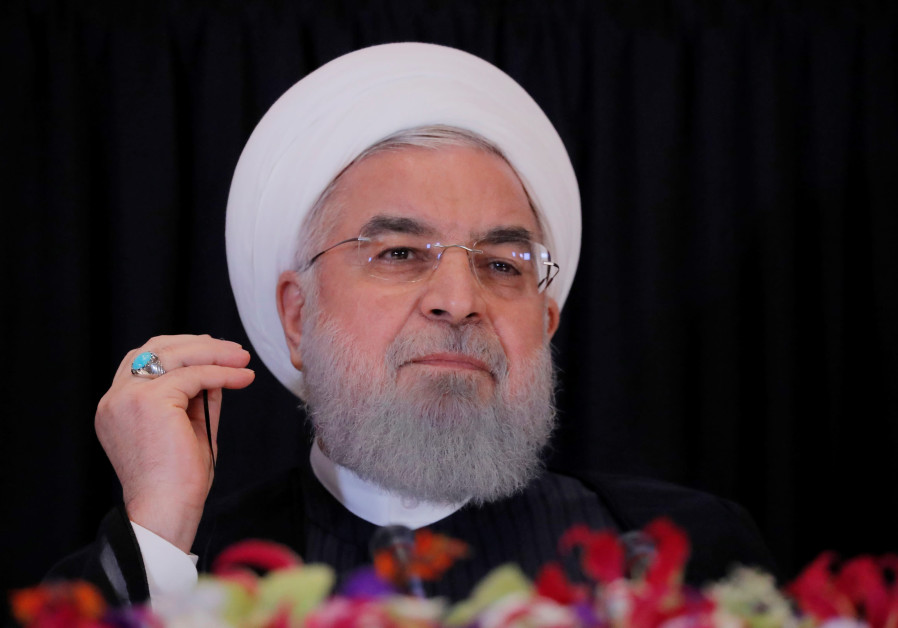 Iran's President Hassan Rouhani listens during a news conference on the sidelines of the 73rd sessio