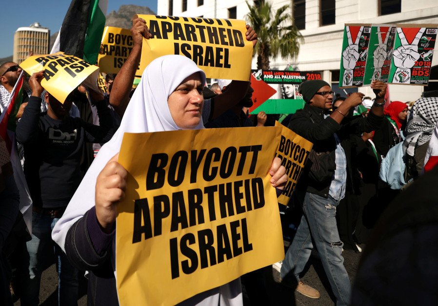 Protestors call for the severing of diplomatic ties with Israel during a march in Cape Town