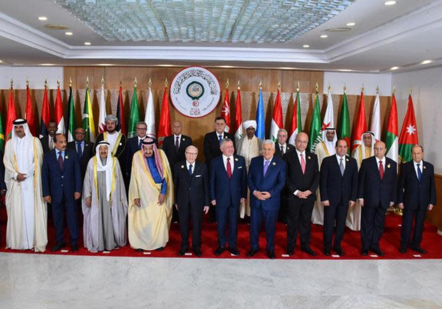 Arab leaders pose for the camera, ahead of the 30th Arab Summit in Tunis, Tunisia March 31, 2019