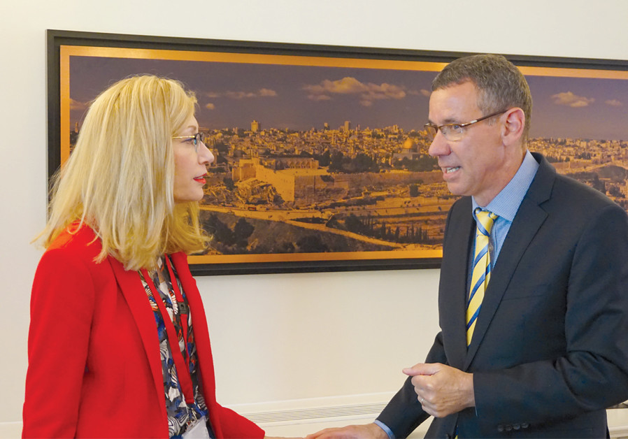 REGEV WITH the writer at the London Embassy. (Credit: MICHAEL FRIEDSON/THE MEDIA LINE)