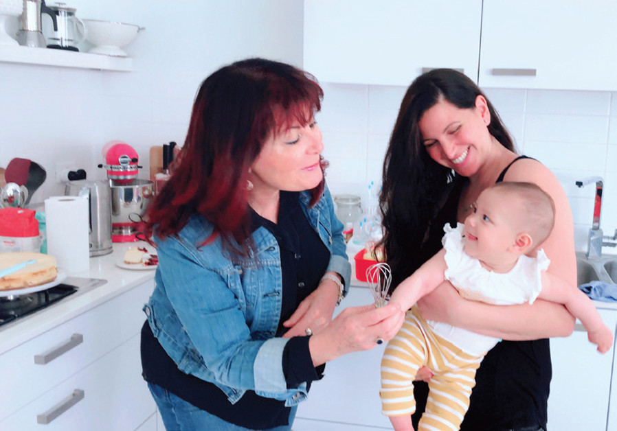 – and little Danielle – in their kitchen. (Credit: PASCALE PEREZ-RUBIN)