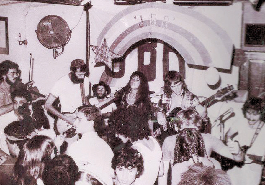 EMIL LEUCHTER leads the Jerusalem Blues Band at the JBR – Jazz Blue Rock club circa 1981, with singer Libi, drummer Don Slovin, guitarists Victor Azus, bassist Federico Erlich and violinist Yonatan Miller. (Credit: Mark Feffer)