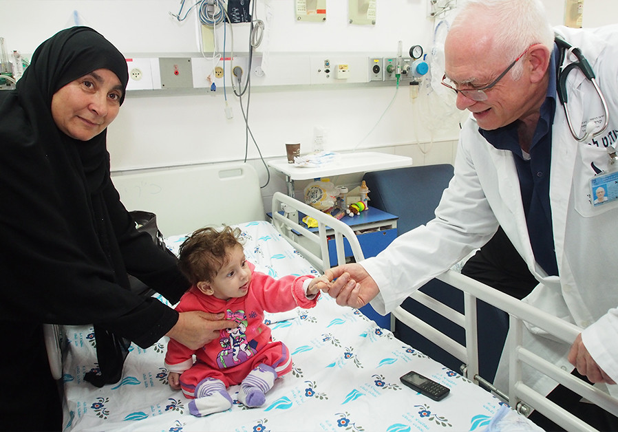 Dr. Akiva Tamir with Aiman from Gaza, and his mother (Credit: SACH)
