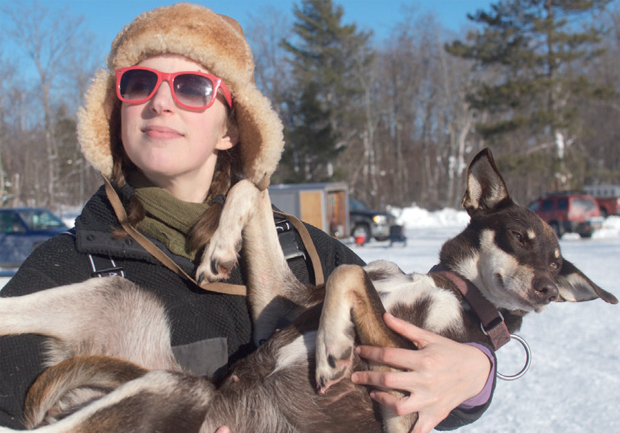 Blair Braverman holding a beloved dog in Anchorage (Courtesy)