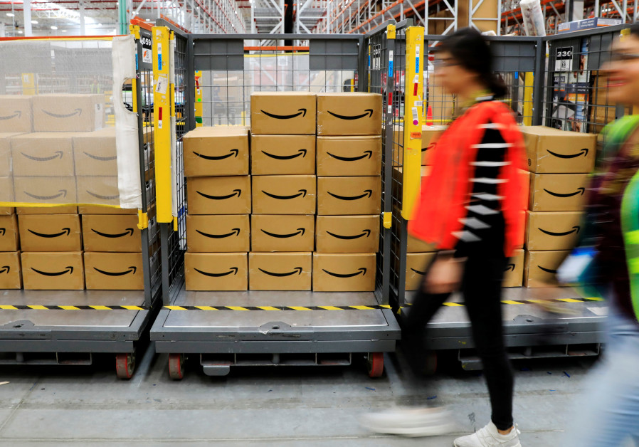 Amazon packages are seen at the new Amazon warehouse during its opening announcement on the outskirt
