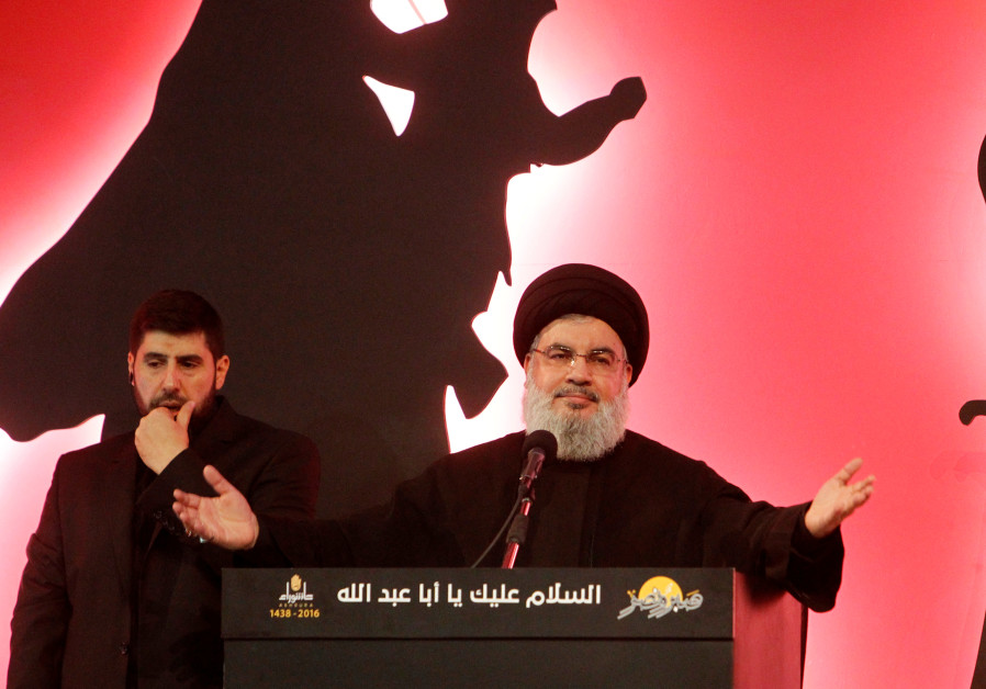 Hezbollah leader Sayyed Hassan Nasrallah addresses his supporters during a public appearance at a re