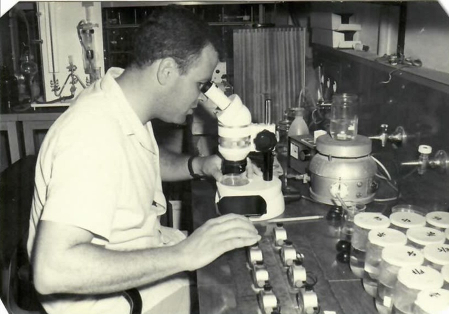 Prof. Moshe Gophen researching zooplankton from the Sea of Galilee in May 1968 (Credit: PR) 