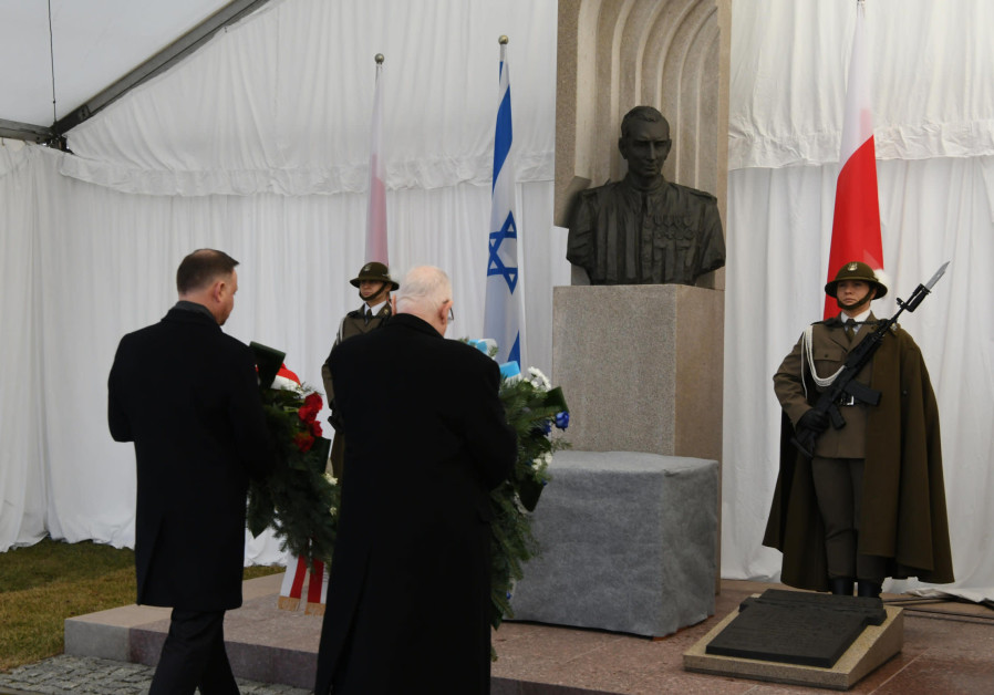 President Reuven Rivlin lays a wreath with Polish President Andrzej Duda on International Holocaust Remembrance Day, January 27, 2020 (Photo Credit: Amos Ben Gershom/GPO)
