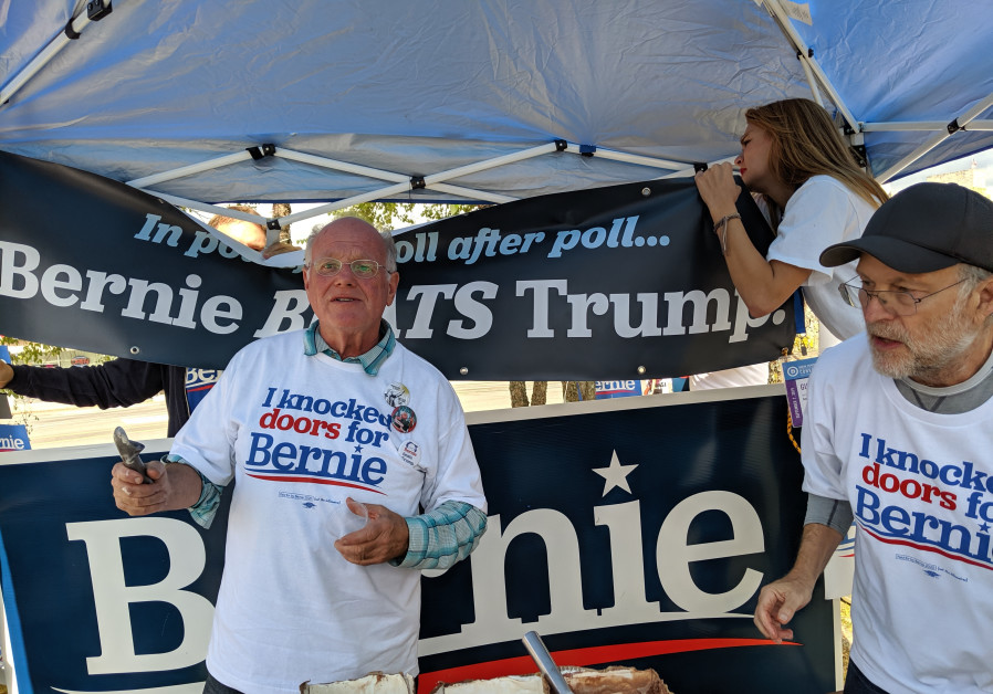 Ben & Jerry’s Ice Cream founders Ben Cohen (left) and Jerry Greenfield prepare to scoop ice cream for Bernie Sanders supporters outside the New Hampshire State Democratic Convention in September 2019. (Credit: Darren Garnick)