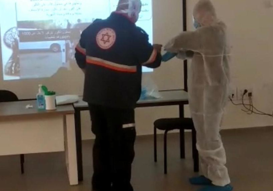  Palestinian medical staff undergo COGAT-instructed COVID-19 protection training (Photo credit: COGAT)
