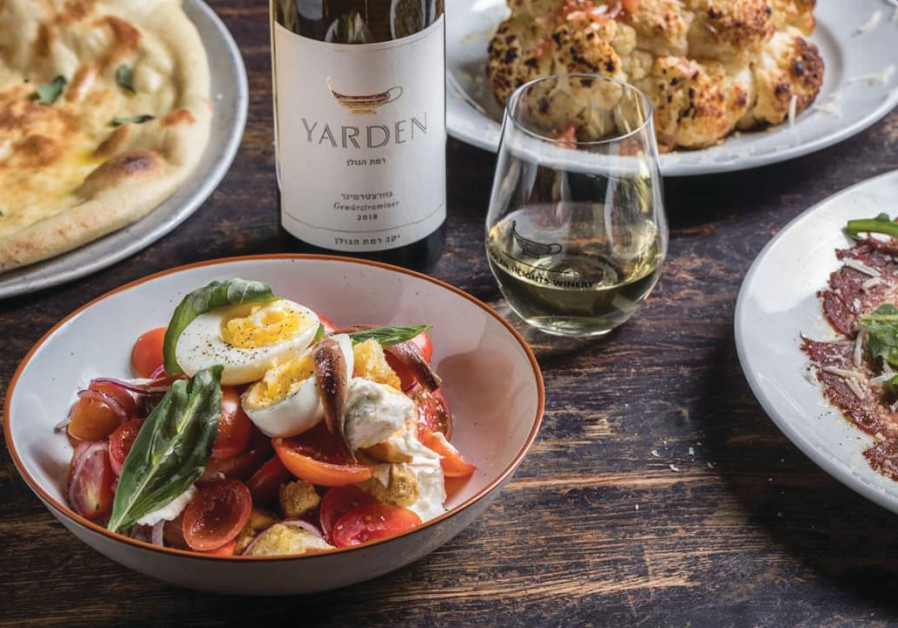 An informal meal is enhanced by a tumbler of vino (Photo Credit: Golan Heights Winery)