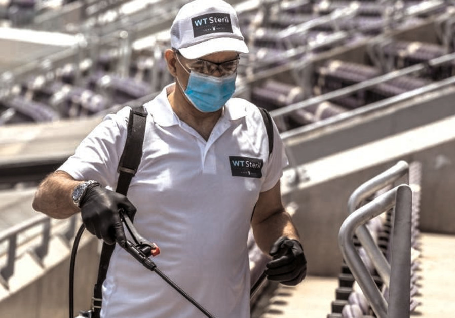 Official disinfecting at Bloomfield Stadium (Photo credit: AMIR MAYBLAT/COURTESY)