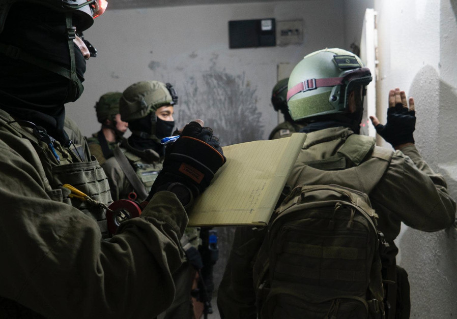 IDF soldiers map the house of Nizmi Abu Bakar, who is suspected of murdering First Sergeant Amit Ben Yigal, June 11, 2020 (Photo Credit: IDF Spokesperson's Unit)