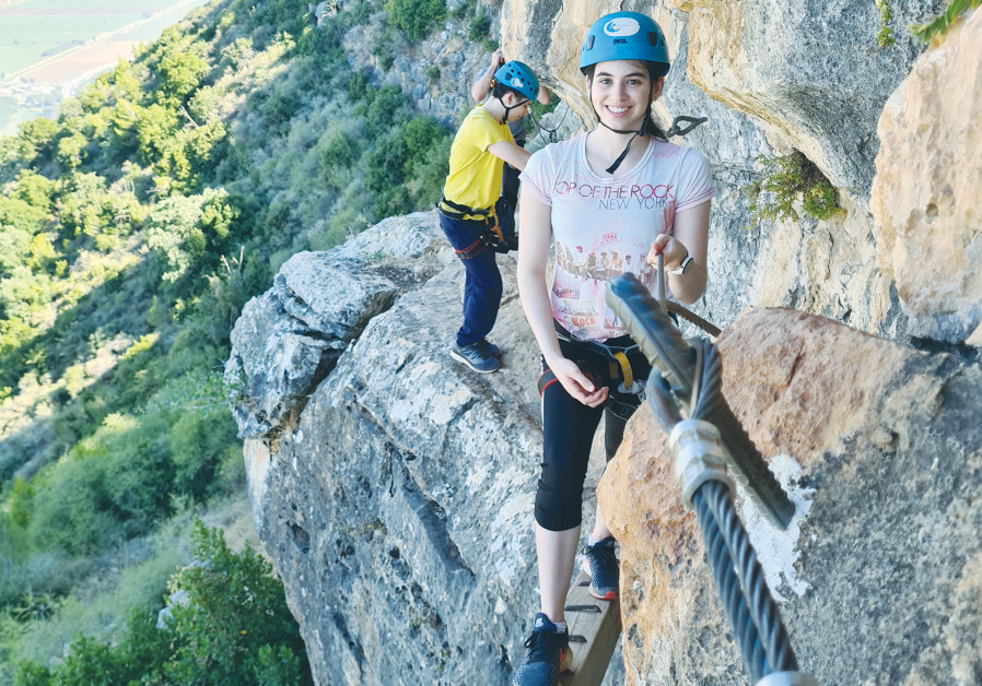 The Via Ferrata route for climbing and walking on the edge of Ramim Cliff in Menara is one of the relatively new attractions in the Kiryat Shmona area. (Credit Taly Sharon)