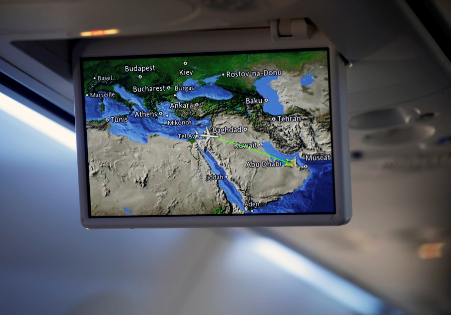 A screen aboard the first flight from Tel Aviv to Abu Dhabi shows passengers the route. (REUTERS/NIR ELIAS)