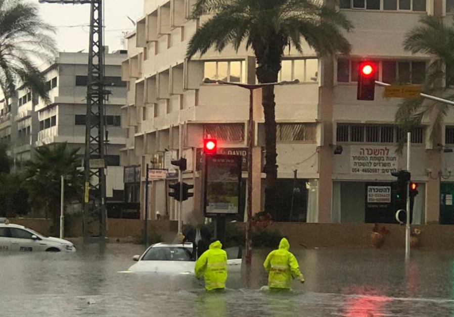 Dozens rescued from floods across Israel as first snow…