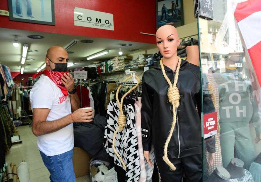 Shop and small business owners protested coronavirus lockdown regulations in Tel Aviv (Avshalom Sassoni/ Maariv).