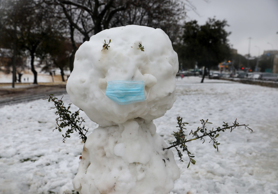 Snowman in Jerusalem, February 18, 2021. (Credit: Marc Israel Sellem/The Jerusalem Post)
