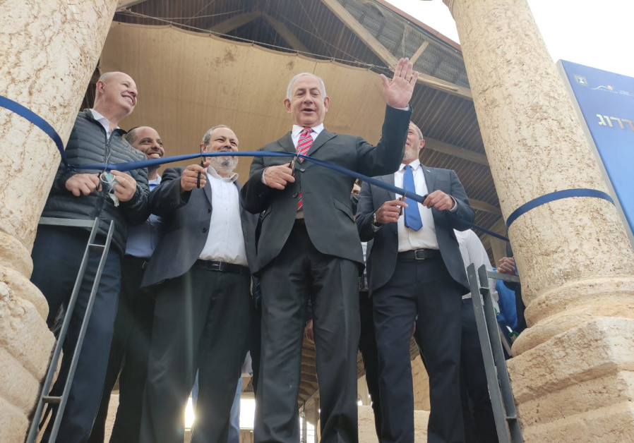 Prime Minister Benjamin Netanyahu cutting a ribbon at the site of the ancient Sussiya synagogue in the South Hebron Hills.(DUDI AVITAN)