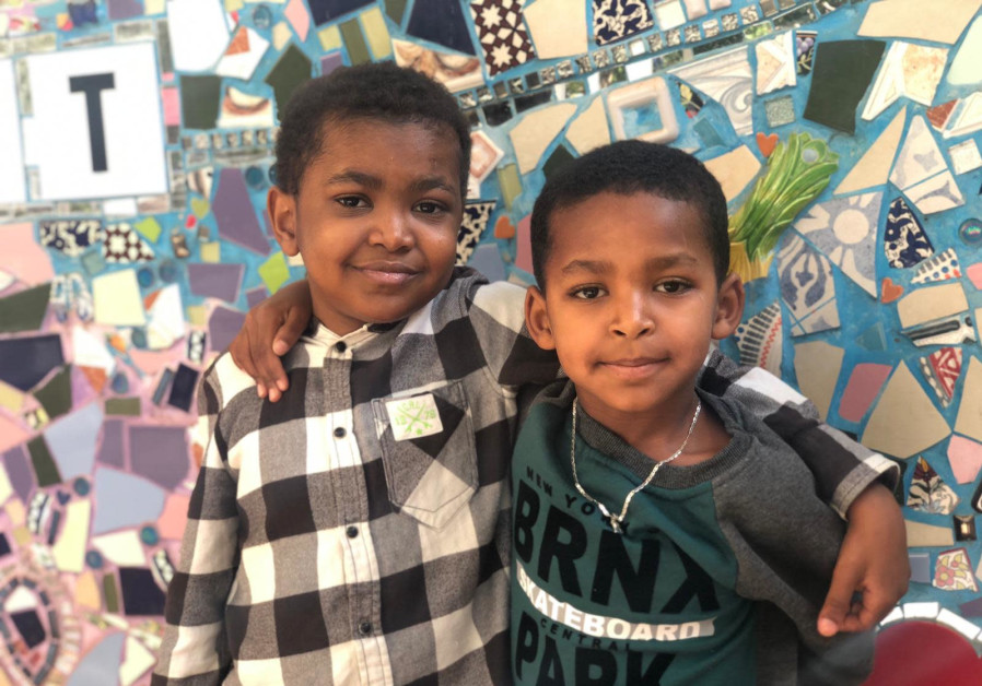 Biniyam Tesfahun Maru is seen alongside his friend Ibrahim.