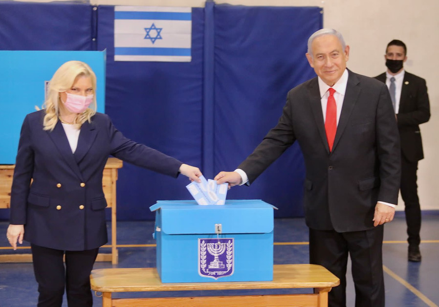 Prime Minister Benjamin Netanyahu and his wife Sara vote on March 23, 2021. (Photo Credit: MARC ISRAEL SELLEM/THE JERUSALEM POST)