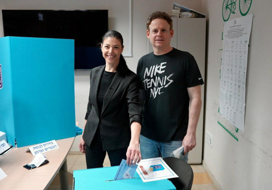 Labor’s leader Merav Michaeli votes with her partner, Lior Schleien. Labor won seven seats (Photo Credit: Courtesy)